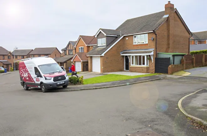 Installer Van Outside Home