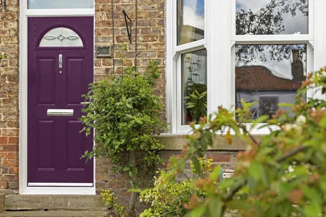 Purple Front Door And White Bay Window